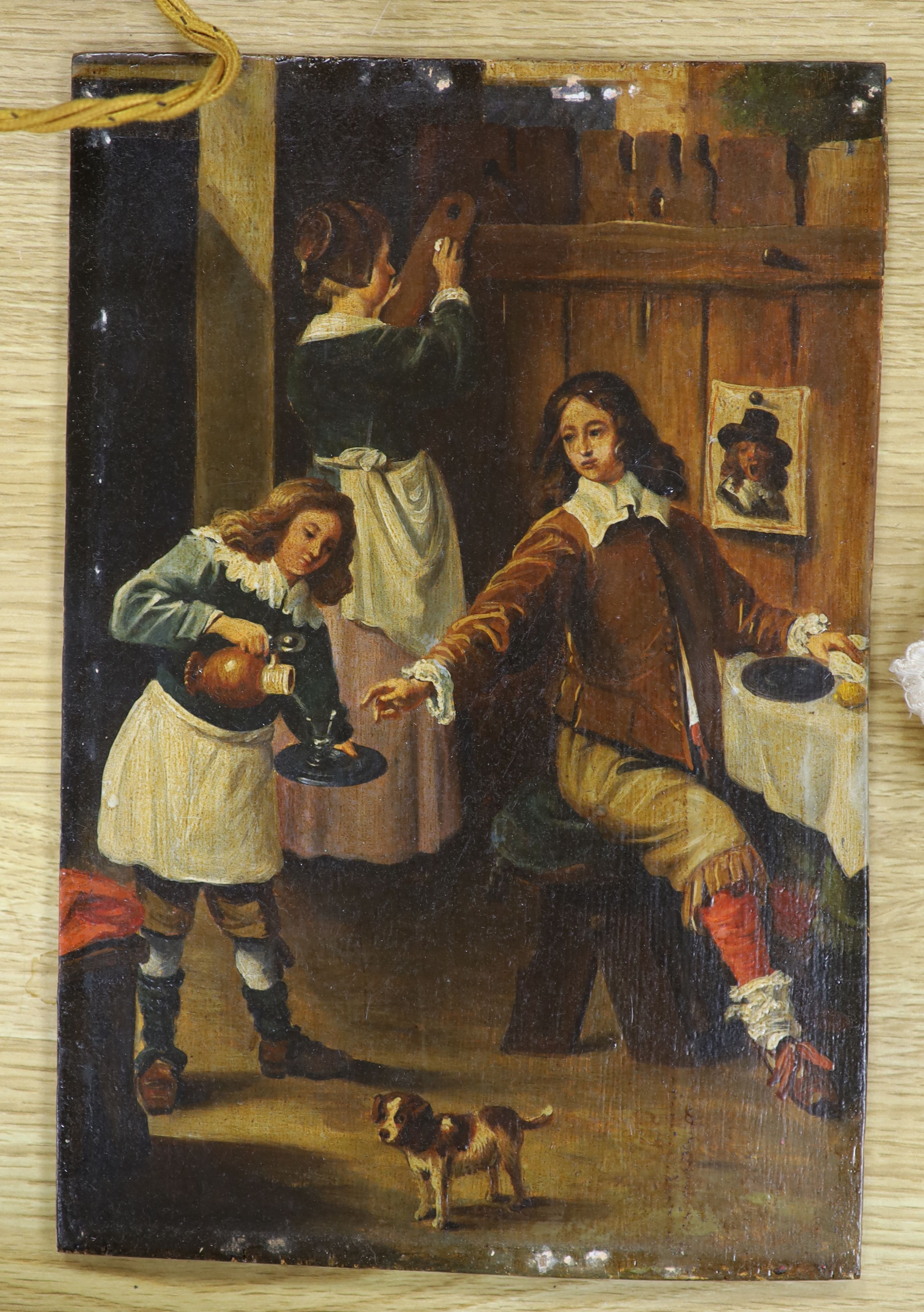 Continental school, study of a tavern interior with figures, a spaniel to the foreground, oil on board, unsigned, 28 x 19cm.